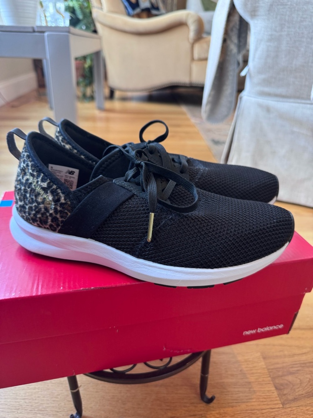 New Balance Black Knit Sneakers with Leopard Heel Accent